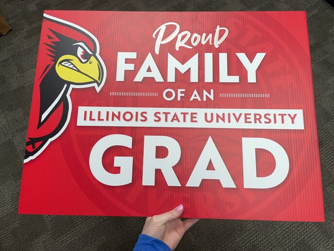 An image of a red Illinois State University graduation sign.